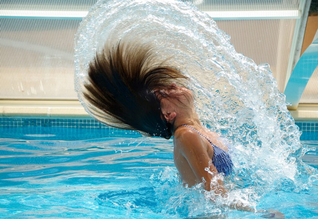 swimming pool, drops of water, dark hair-830505.jpg